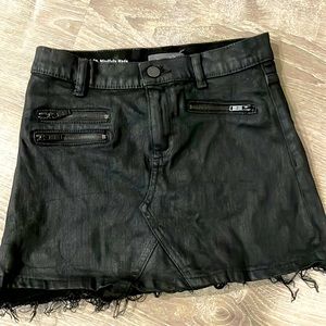 Black denim skirt with zippers. Worn twice. Like new condition